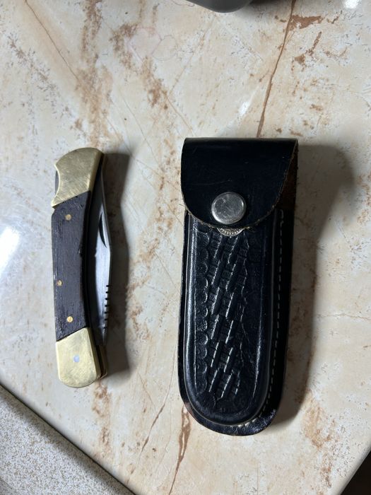 Briceag cu teaca folosit foarte putin!