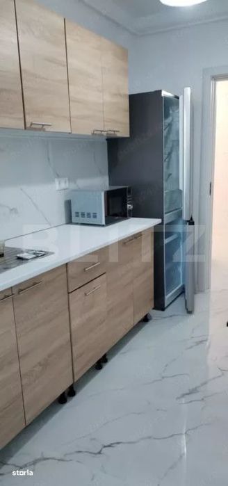 Inchiriere apartament cu doua camere bloc nou+parcare subterana