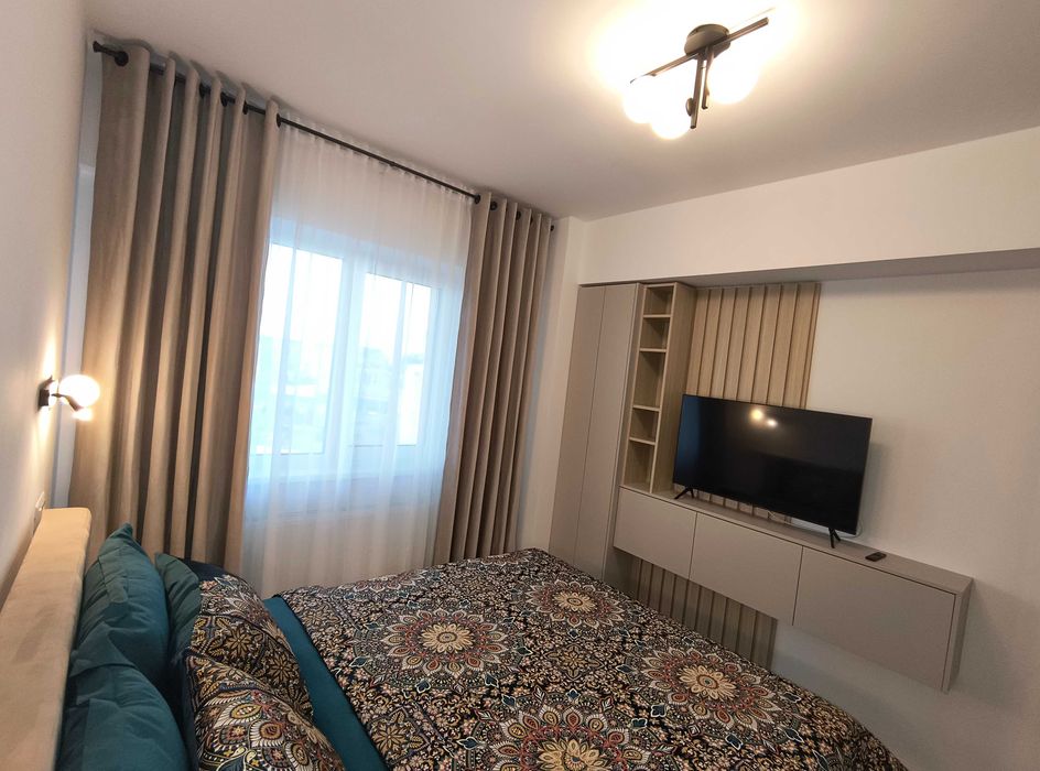 Proprietar ( fara comision)  Apartament 2 camere mobilat si utilat complet, amenajare premium de lux, parcare subterana inclusa, Complex Unirea Towers