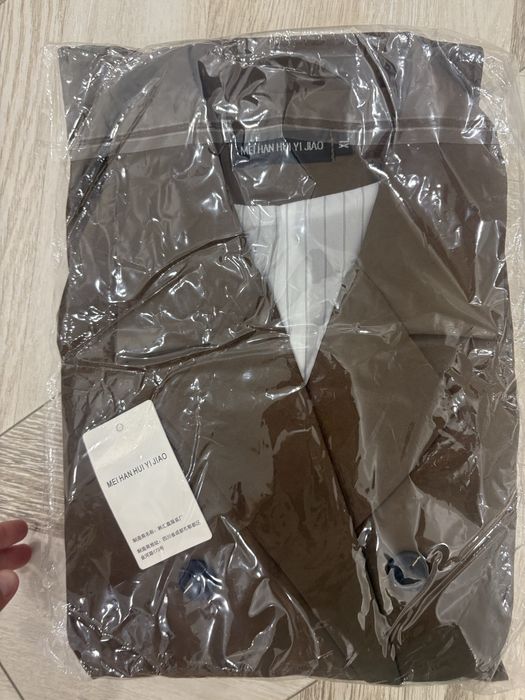 Пиджак коричневый 48-50 размер