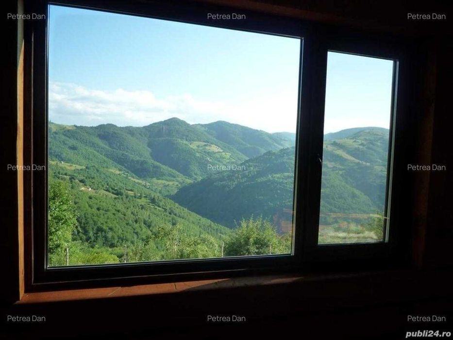 Casa din lemn masiv cu teren in Muntele Rece