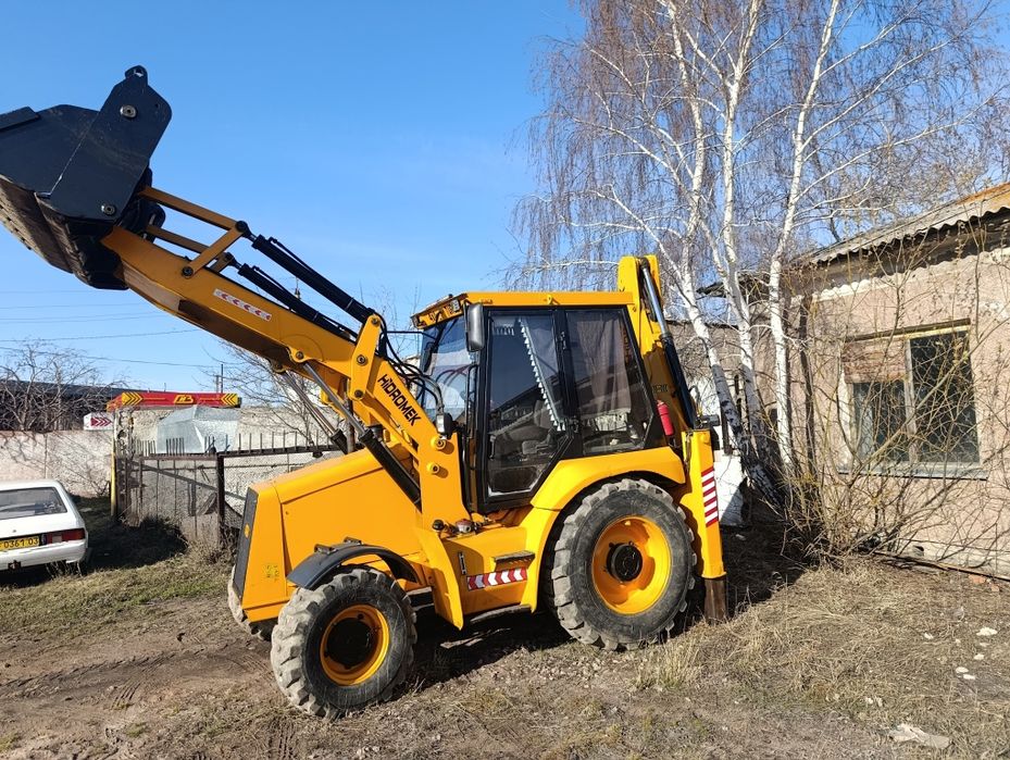 Продам экскаватор погрузчик