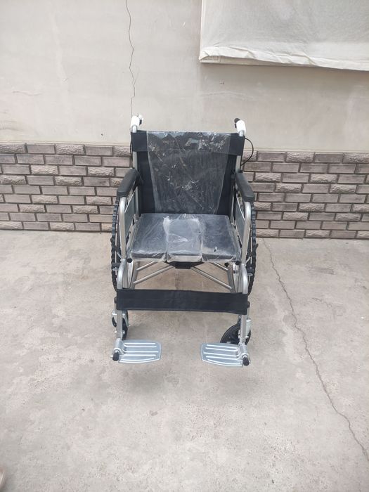 Nogironlar aravasi yangi