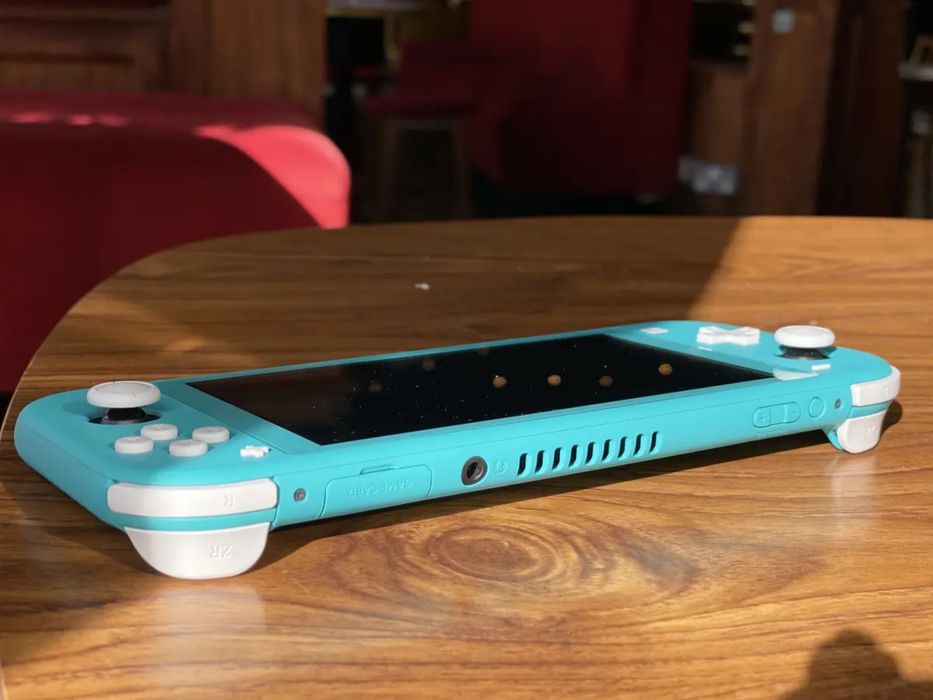 Nintendo Switch Lite Turcoaz - stare impecabilă