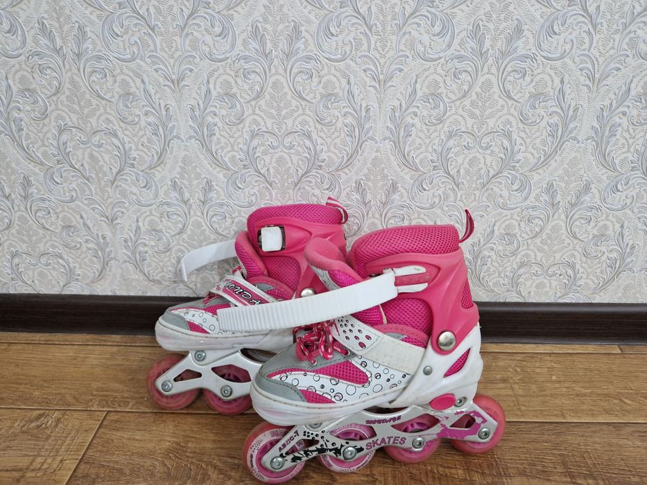 Роликовые коньки
