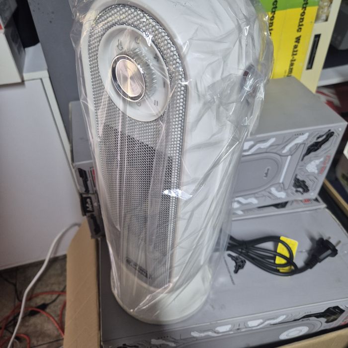 Топ Цена!Ел.Печка с Модерен дизайн 1500w, 2степени,защита от обръщане.