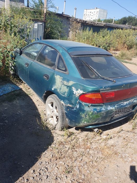 Продам  мазда 323