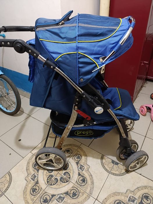 Продам коляску и велик