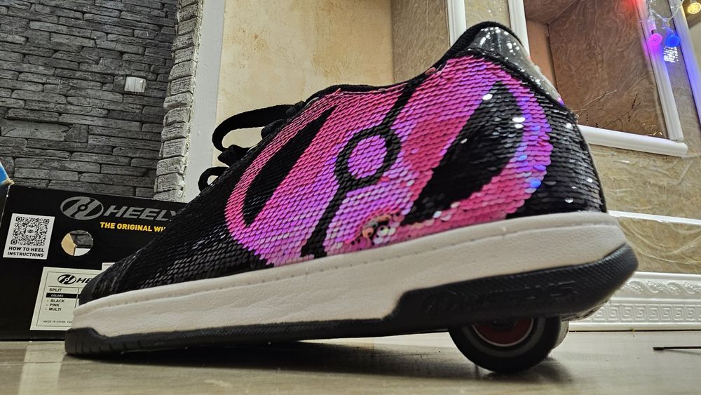Роликовые кроссовки Heelys