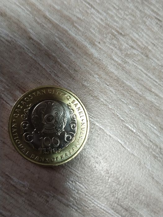 Продам манету новую 100 т