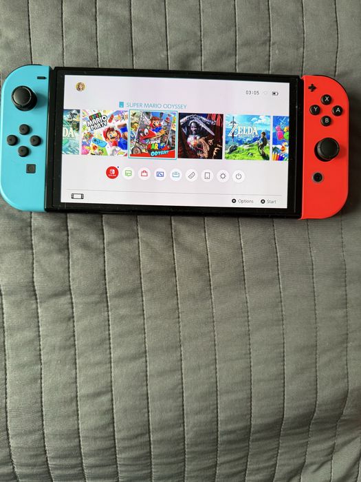 Nintendo Switch OLED 64GB + 4 игри + 128GB SD карта + калъф
