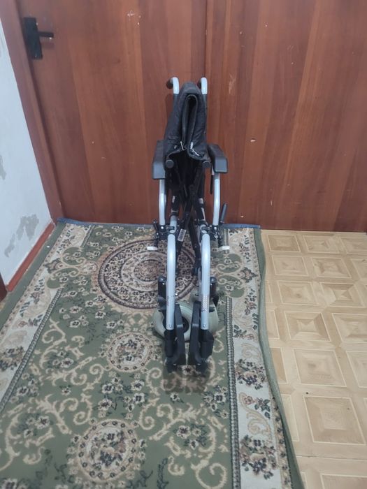 Инвалидная коляска