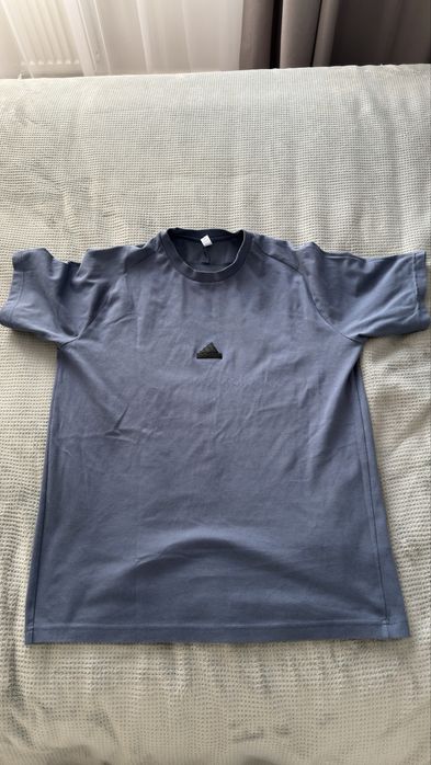 Фотболки Nike, Adidad