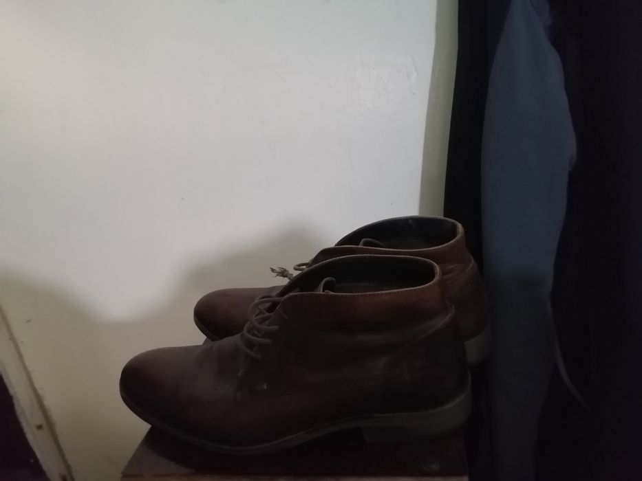 Продам фирменные сапоги.