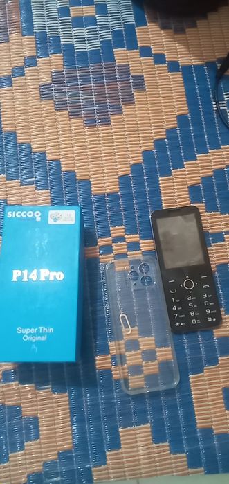 P 14 Pro knopishni telefon aybi yoq karobkasi bor