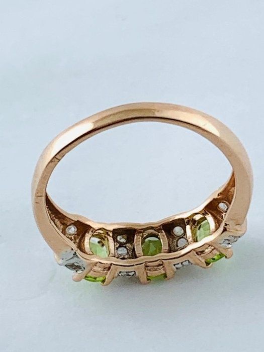 Redus  Inel aur 14 kcu peridot și diamante