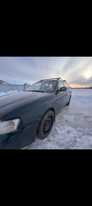 Тайота  Карина е