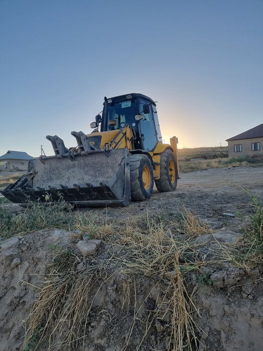 Услуги экскаватор погрузчик