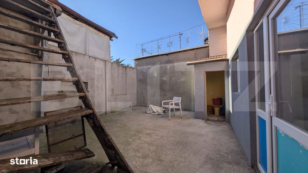Casa cu 2 camere si mansarda ,plus bucatarie de vara .