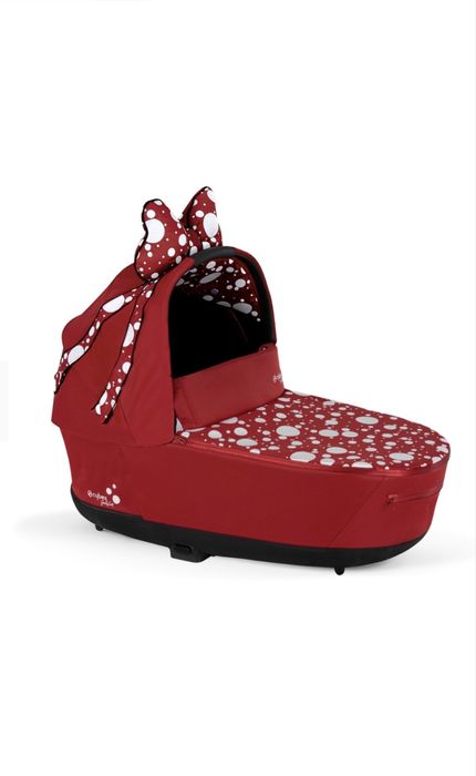 Cybex Priam 4 Petticoat Red by Jeremy Scott кош за новородено тапицерия и чувал