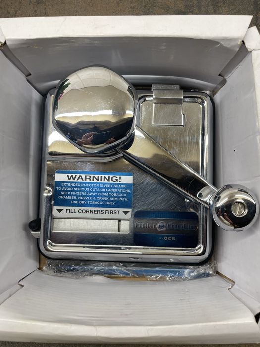 Aparat manual pentru facut tigari.