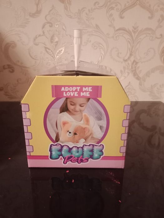 Продаю игрушечную пушистую кошку