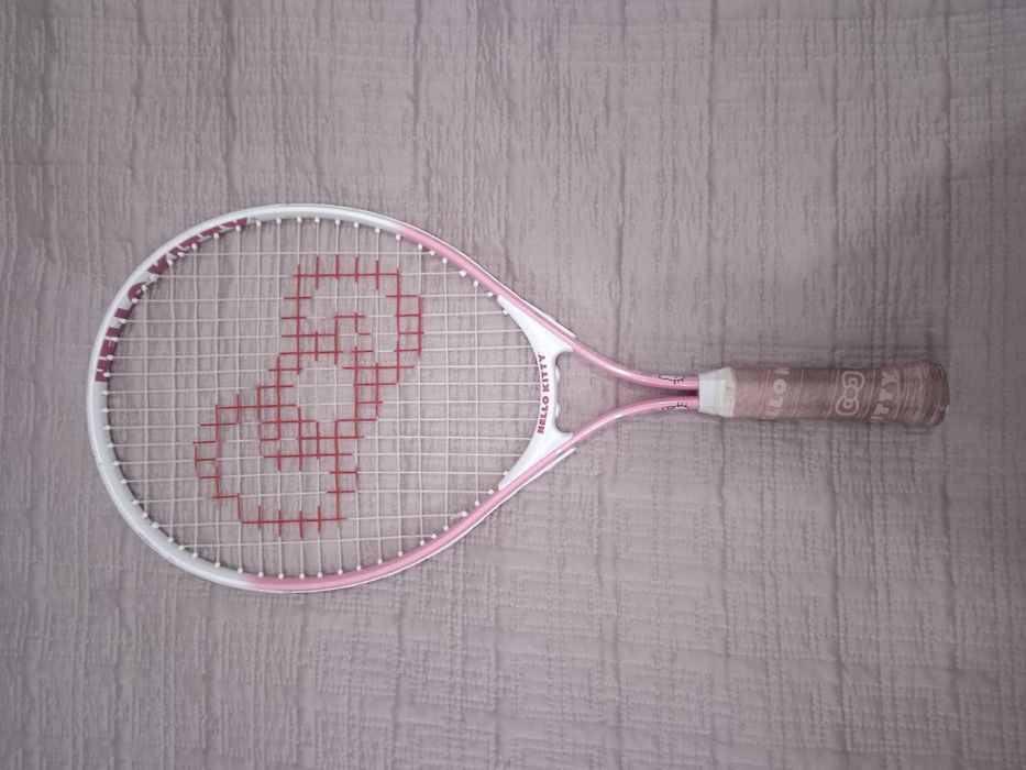 Теннисная ракетка