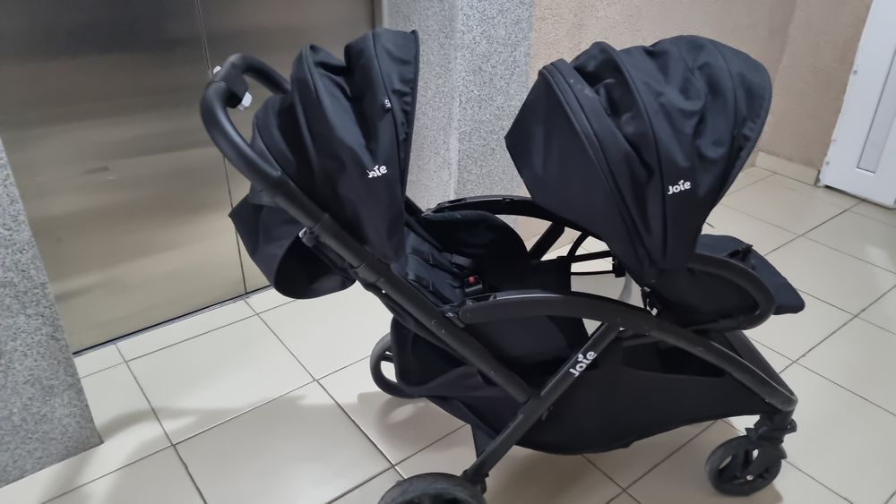 Коляска для погодок