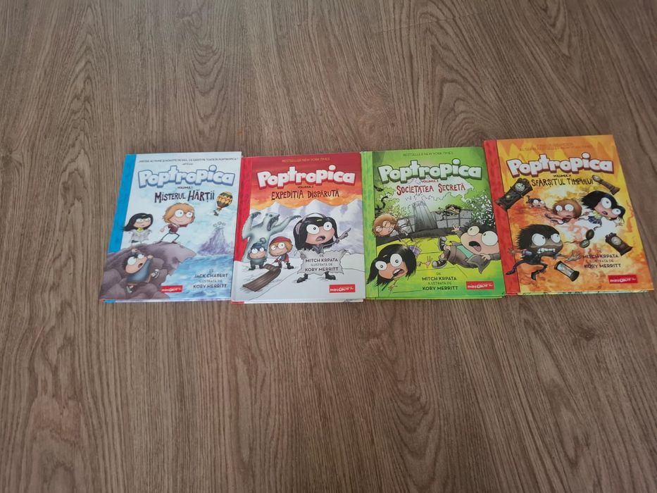 Vând cărțile poptropica 1-4