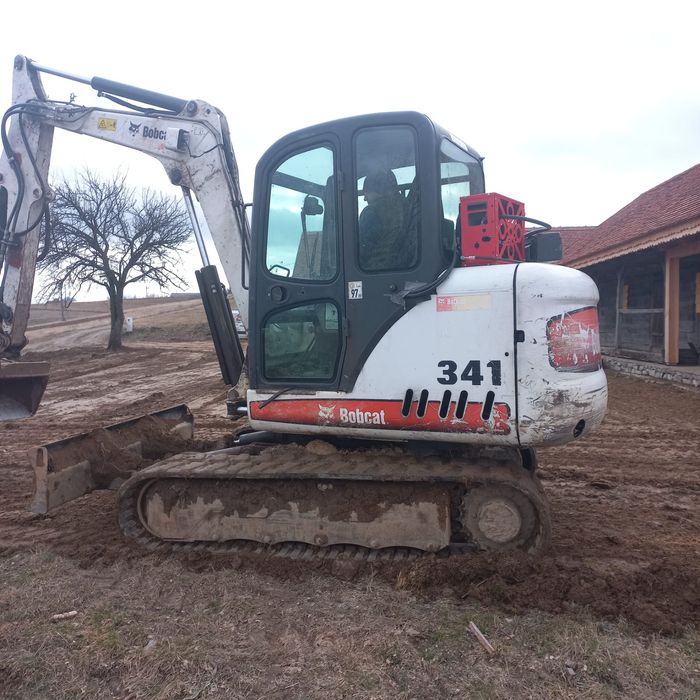 Excavator de vanzare