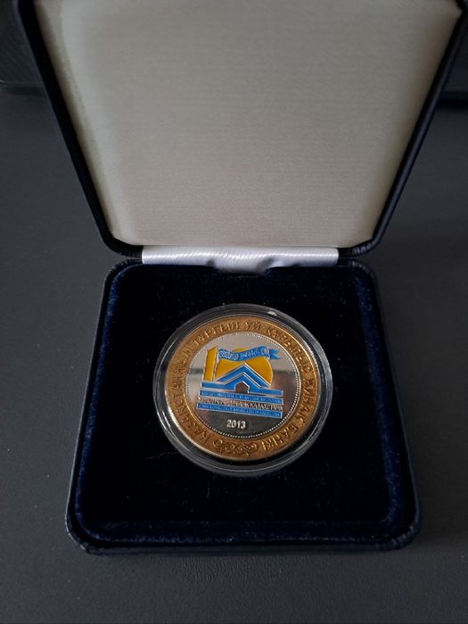 Серебряная монета "10 летие Жилстройсбербанка Казахстана"