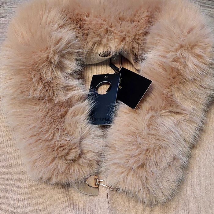 Дамска жилетка с пух