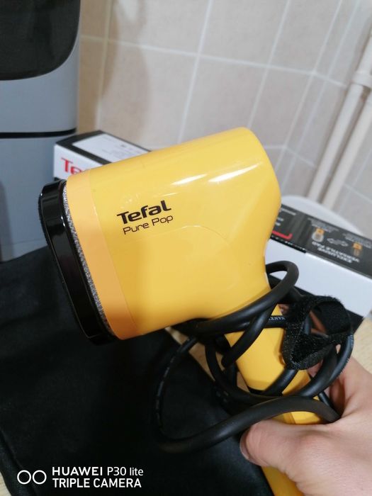 Aparat de calcat vertical cu abur Tefal