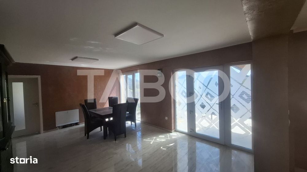 Casa de vanzare 405 mp utili 2 garaje 250 mp terase Slimnic Sibiu