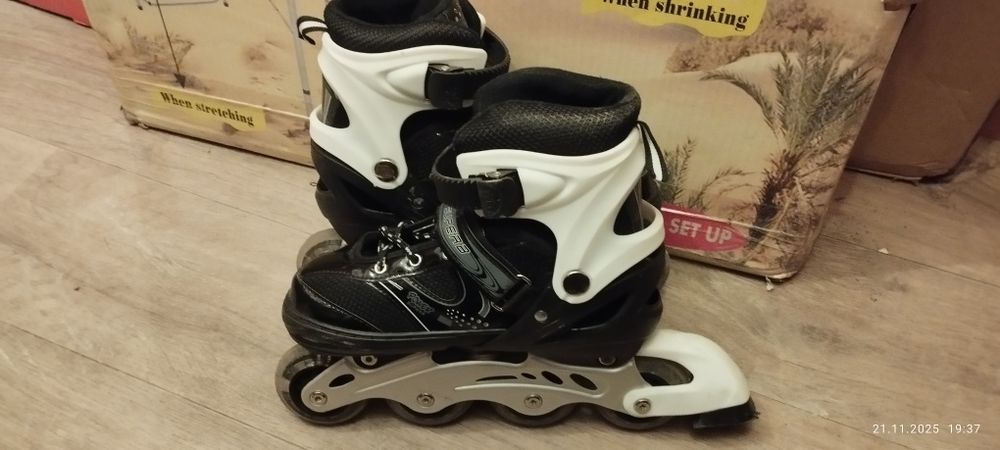 Роликовые коньки