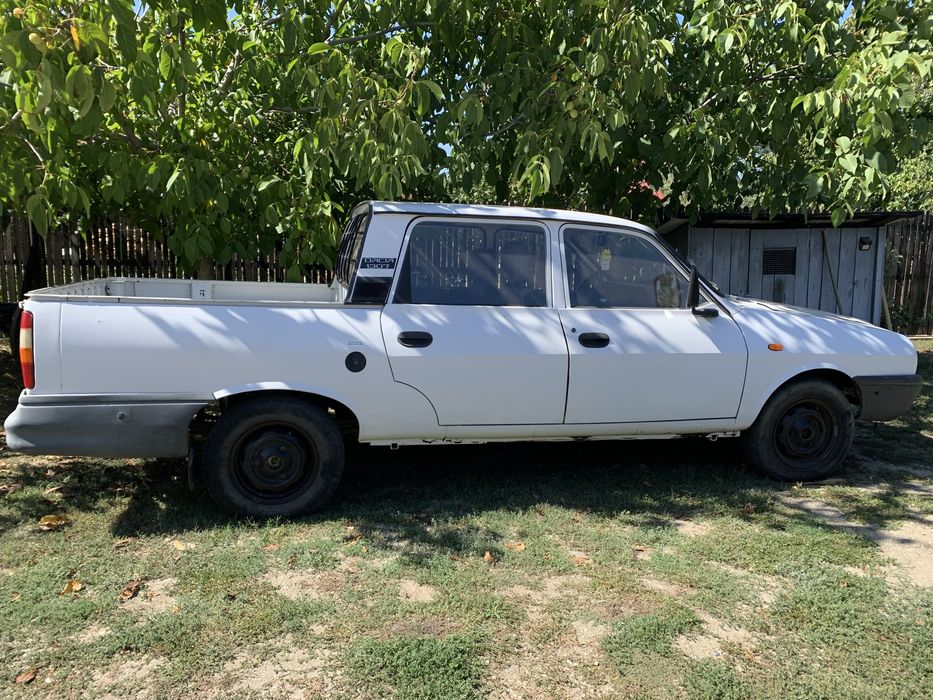 Vand dacia papuc impecabila!!