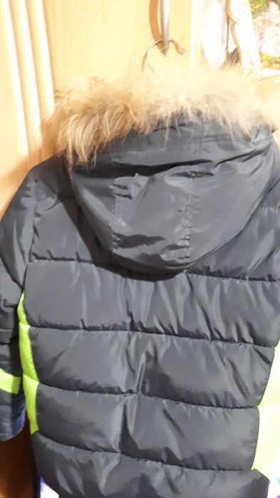 Продам пуховик на мальчика.