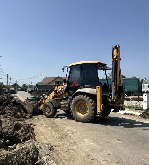 Buldoexcavator si Bascula 8x4 de INCHIRIAT