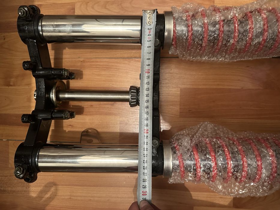 Амортизатор на мотоцикл и трицикл .