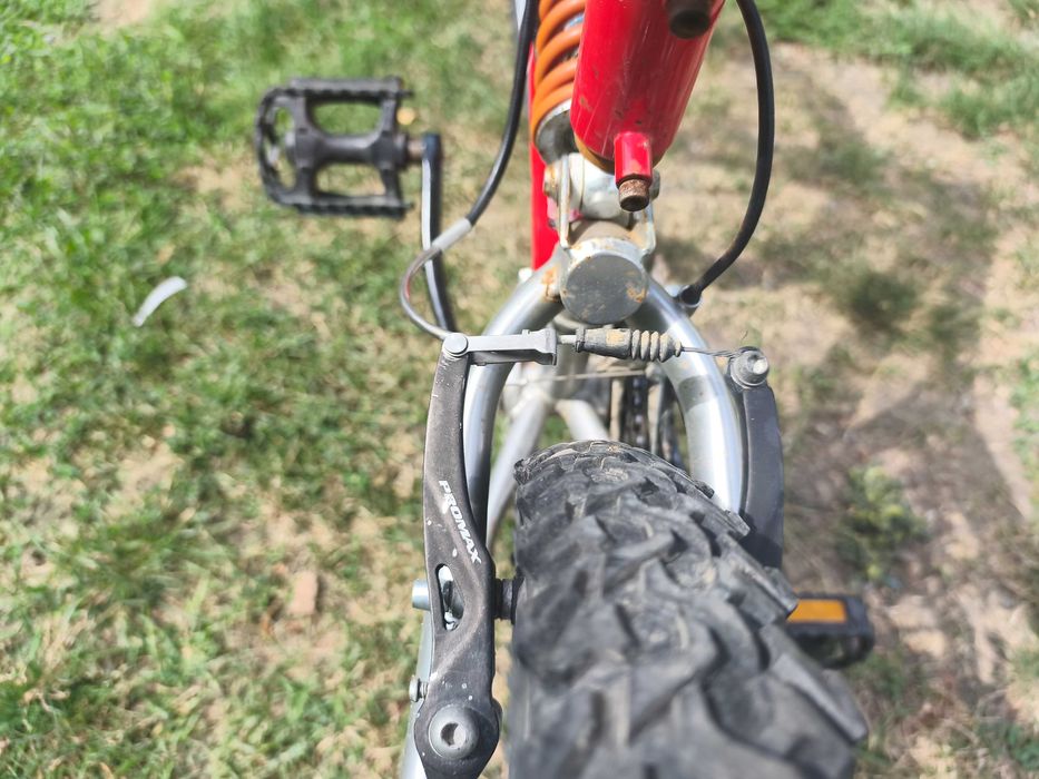 Bicicletă MTB full suspension