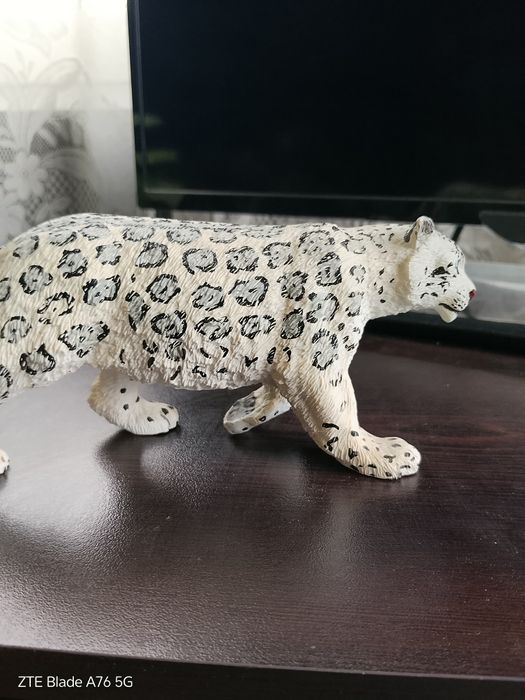 Фигура на снежен леопард