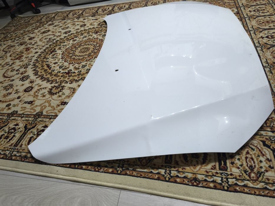 Капот ла Mitsubishi lancer 10