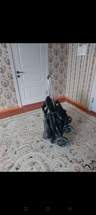 Детское коляска.