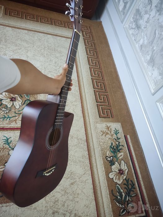 Clasic gitara yangi 2 3 marta ishlatilgan holos xolati chotki