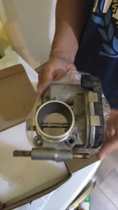 Дроселова клапа.