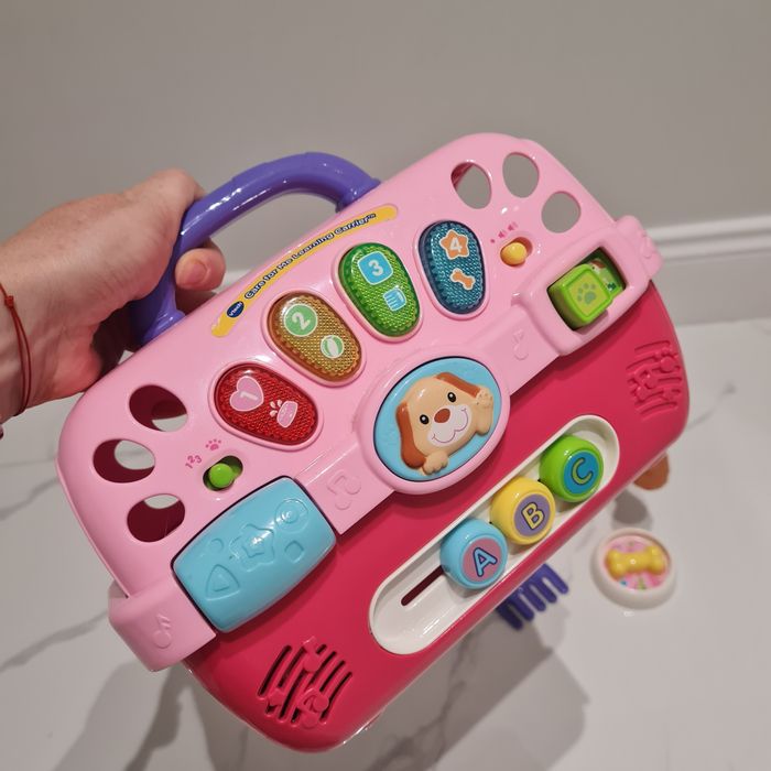 Интерактивна играчка Vtech с куче и клетка за пренасяне.