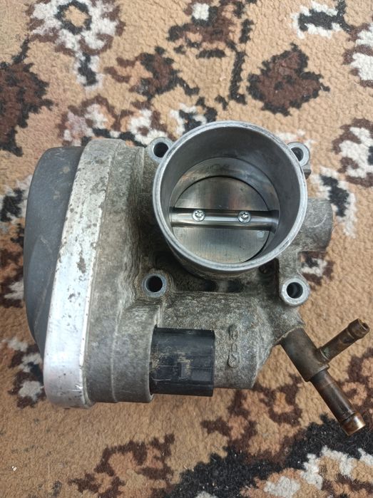 Дроссельная заслонка