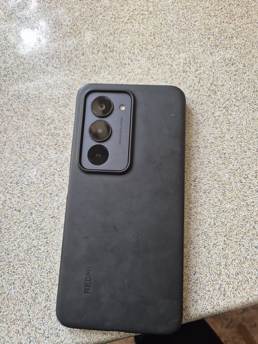 Смартфон Редми 15