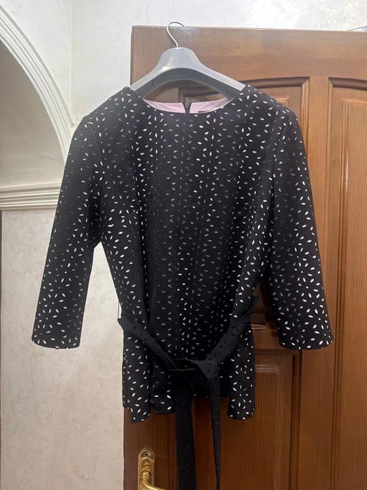 Продам юбочный костюм