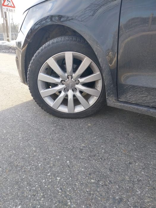 Jante R16 5x100 Originale Audi A1 + 215/45 R16 Allseason Continental